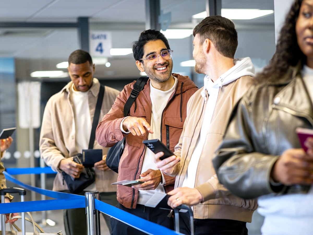 Passengers standing in line at airport