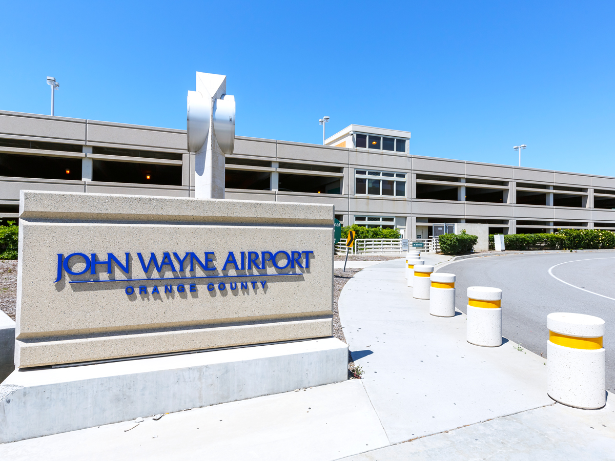 Sign at roadway entrance for John Wayne Airport in Orange County, California