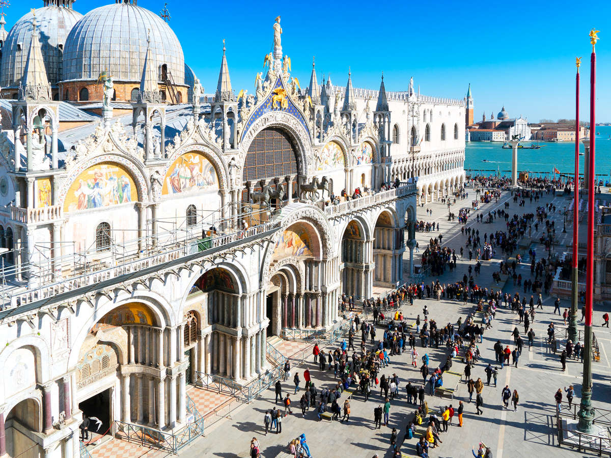 Crowds of tourists in front of Cathedral of San Marco in Venice, Italy