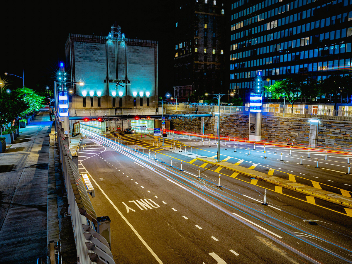 View of entrance to Hugh L. Carey Tunnel in Lower Manhattan at night