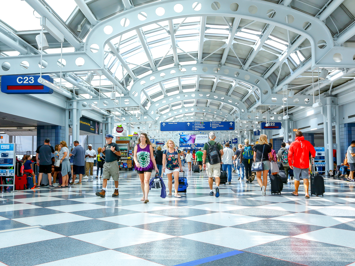 Passengers transiting terminal at Chicago O'Hare Airport