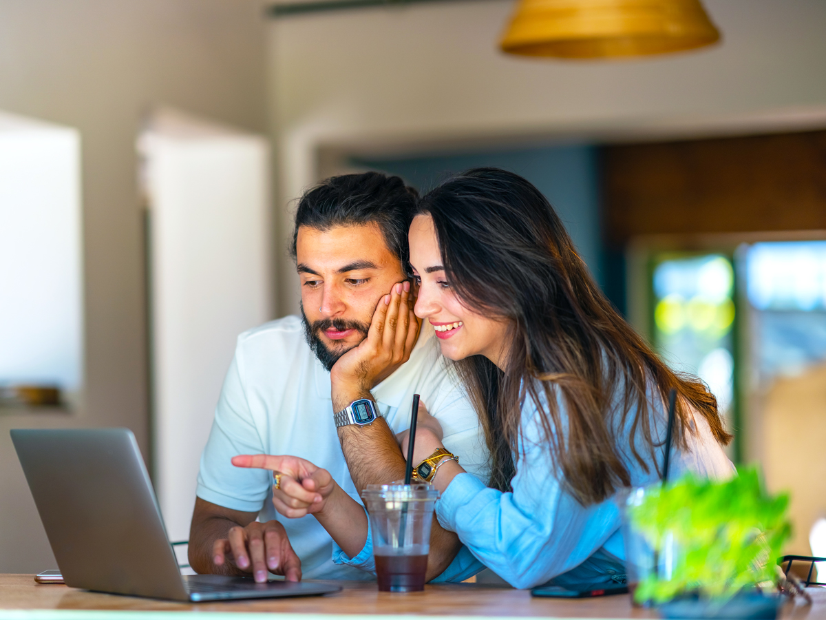 Couple looking at laptop computer