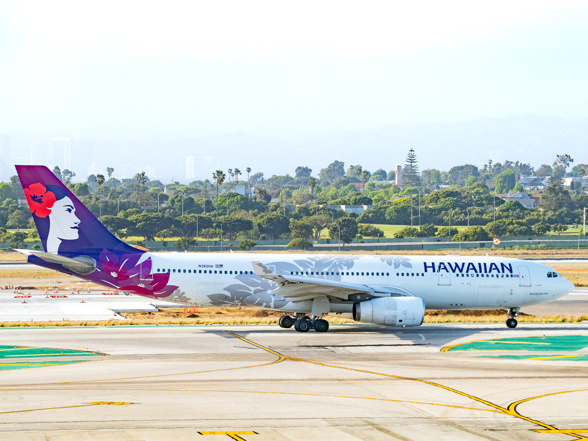 Hawaiian Airlines aircraft lining up for takeoff