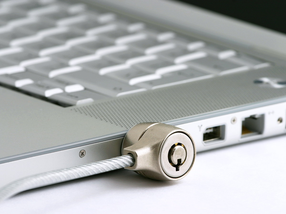 Lock secured to laptop computer
