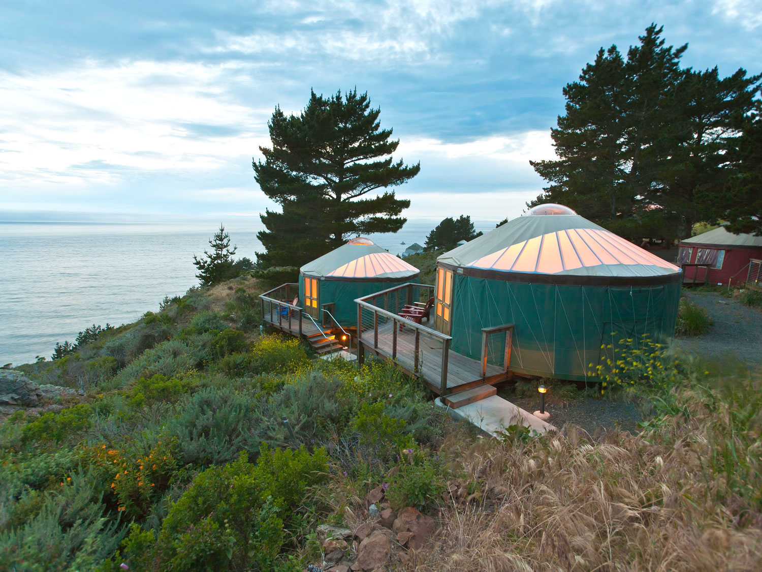 Glamping tents overlooking coastline of Big Sur, California