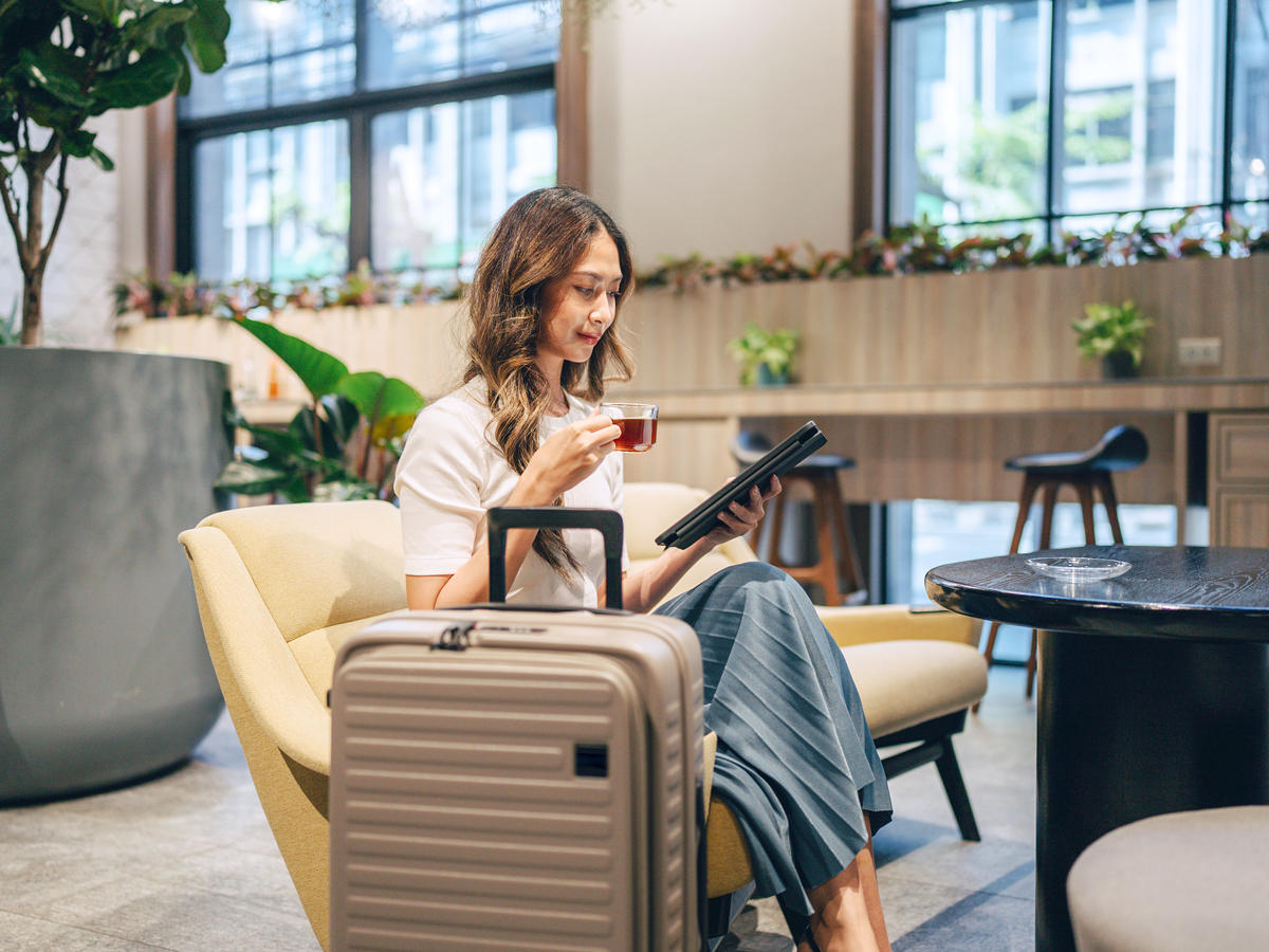 Traveler relaxing in airport lounge