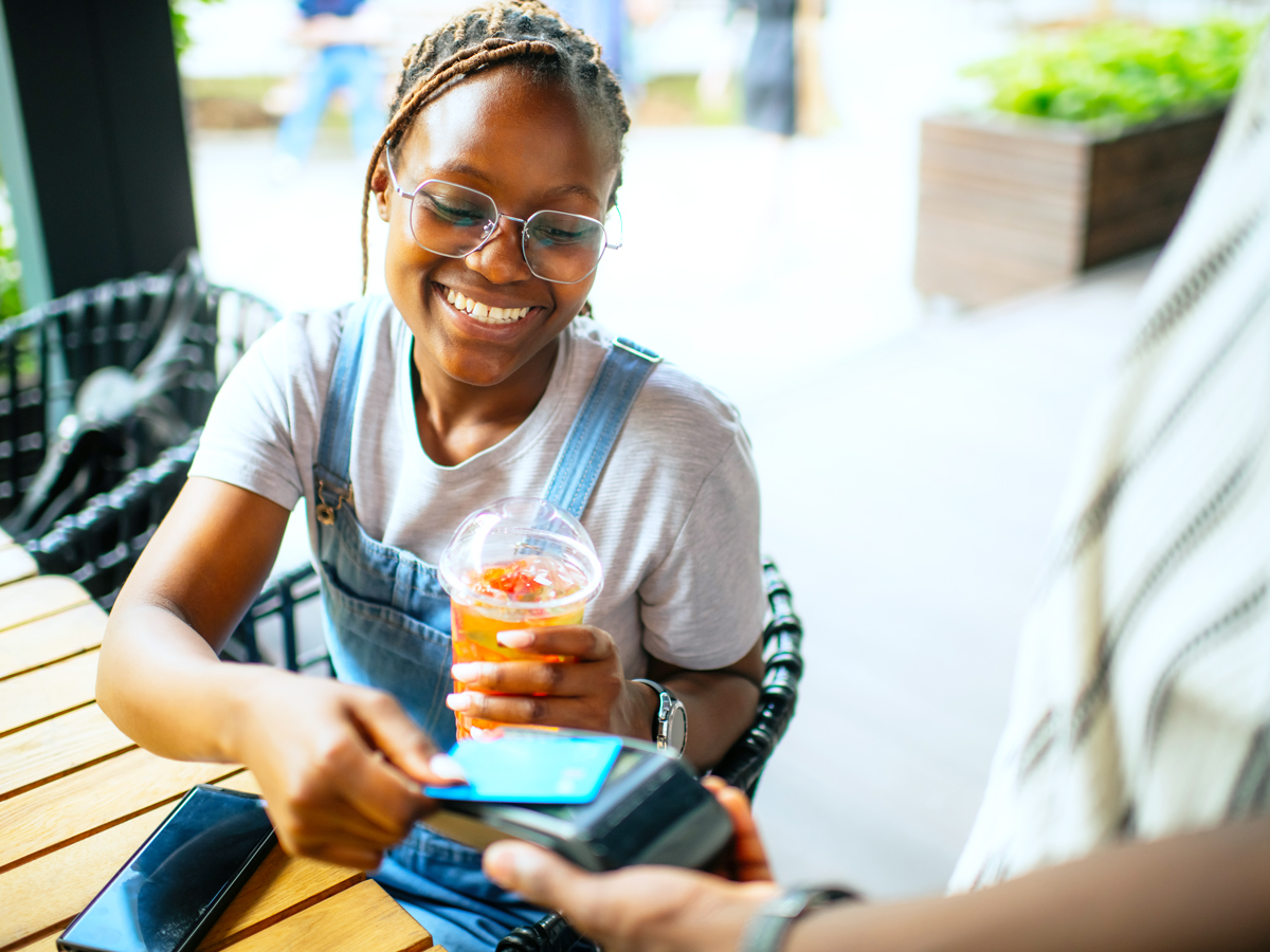 Woman paying with credit card