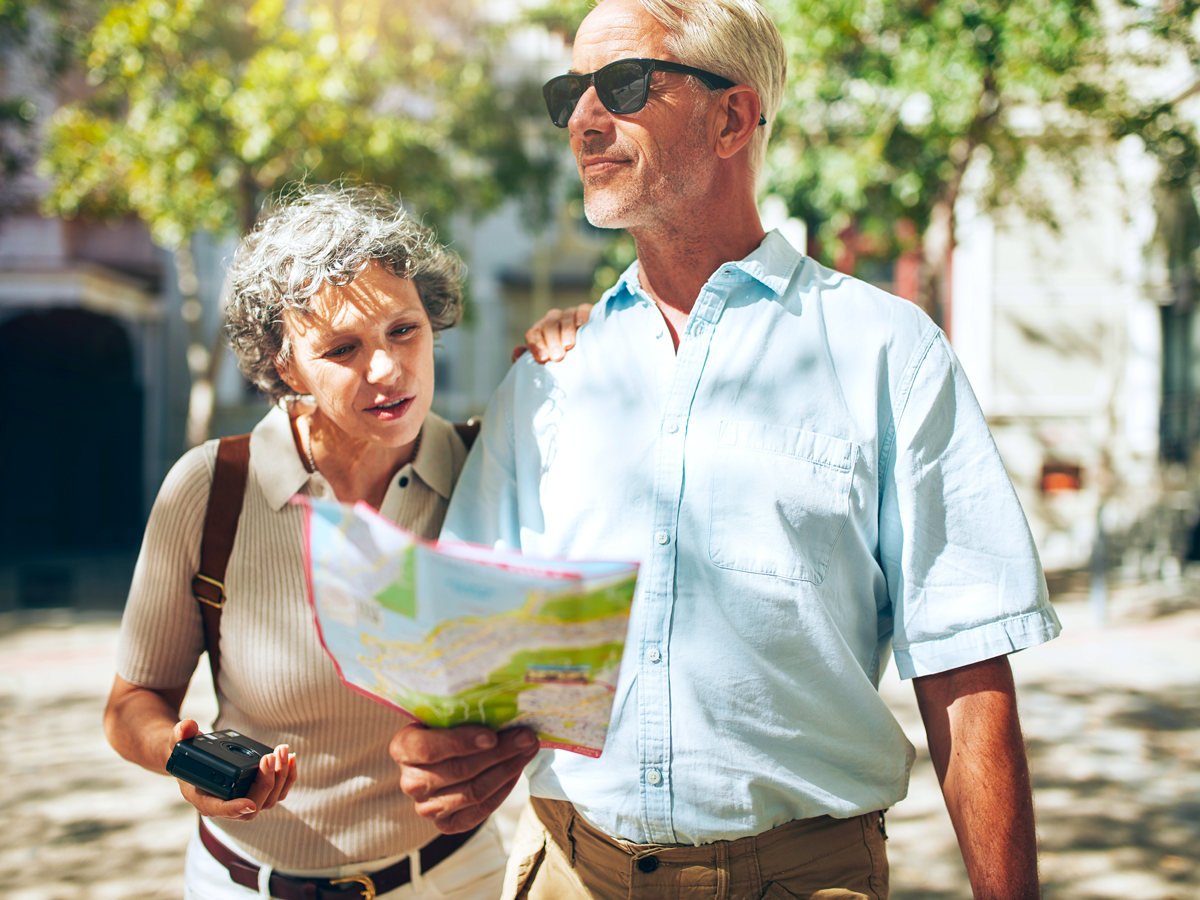Tourists looking at paper map