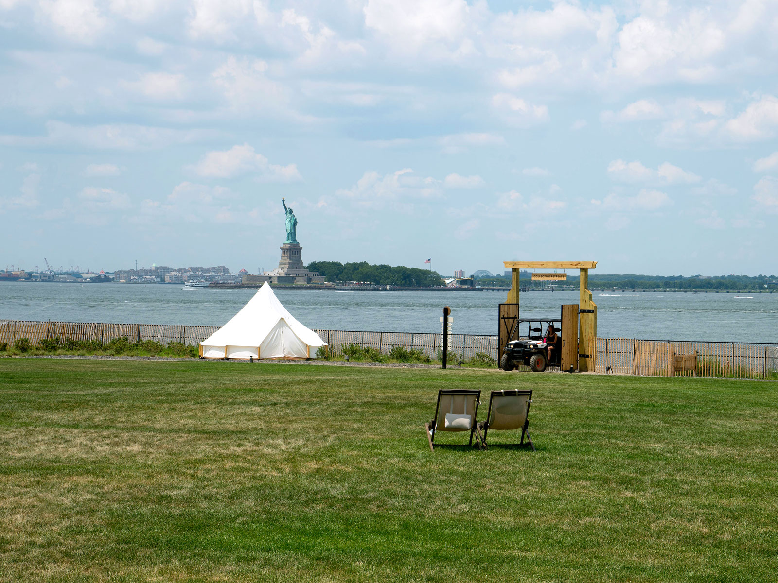 Glamping tent at Collective Governors Island overlooking the Statue of Liberty
