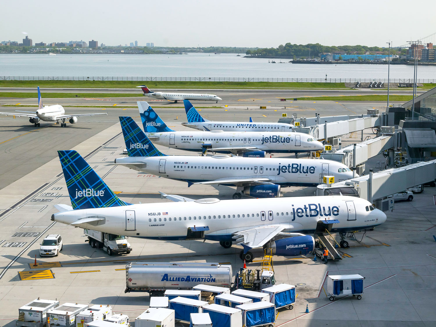 JetBlue aircraft parked at gates at New York's LaGuardia Airport