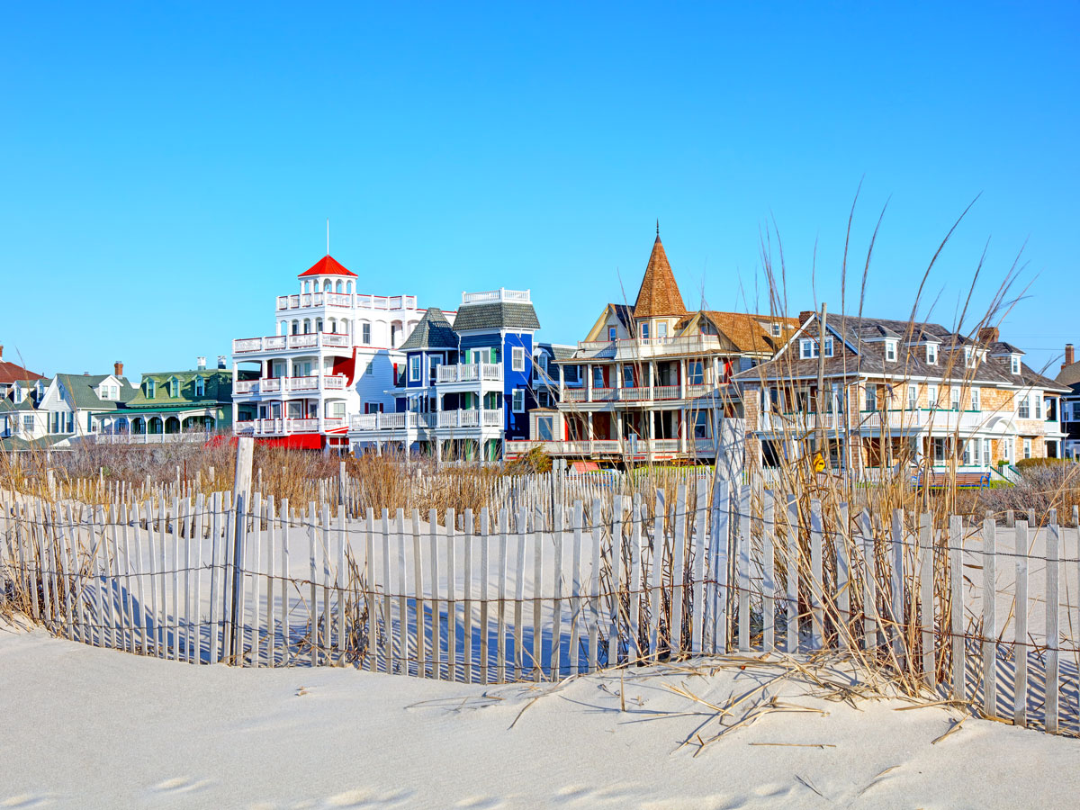 Victorian homes along sandy beach in Cape May, New Jersey