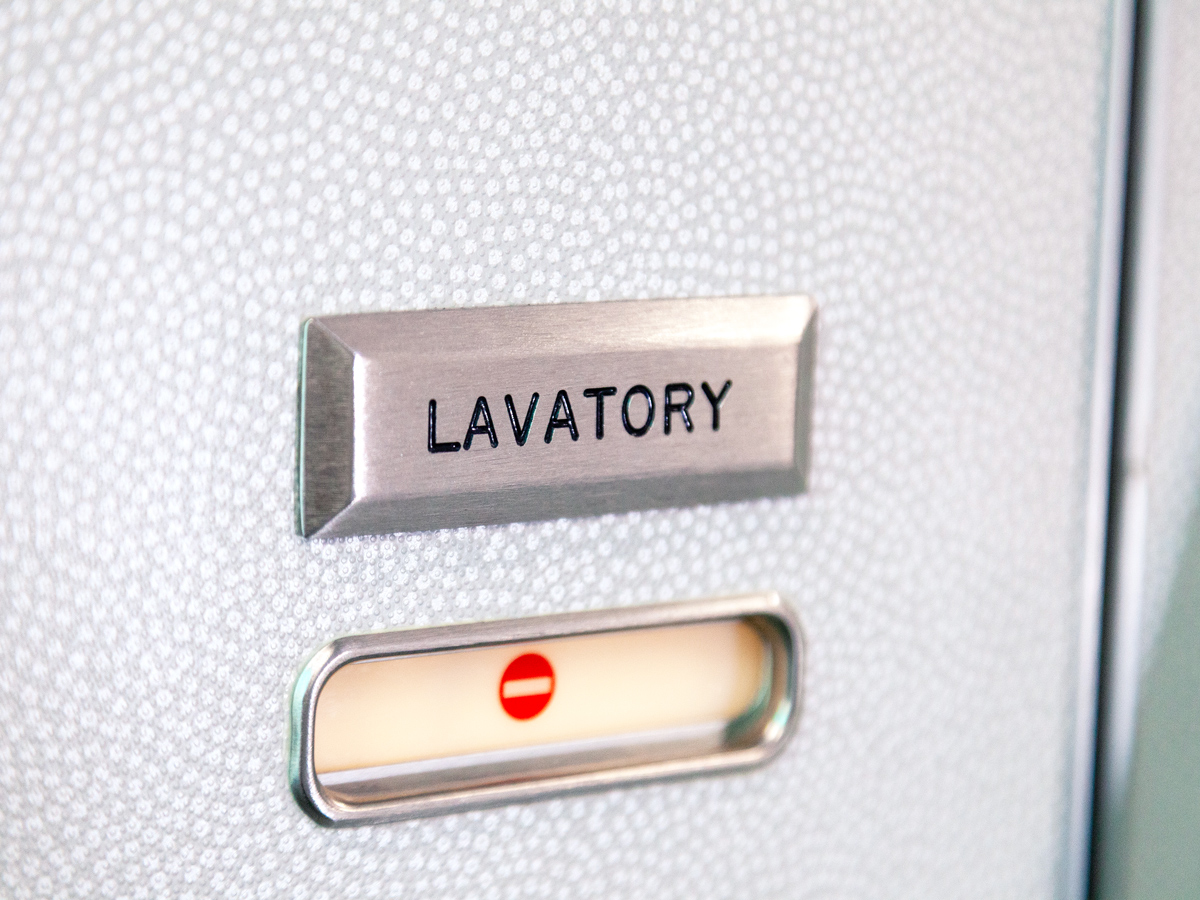 Occupied sign on aircraft lavatory door