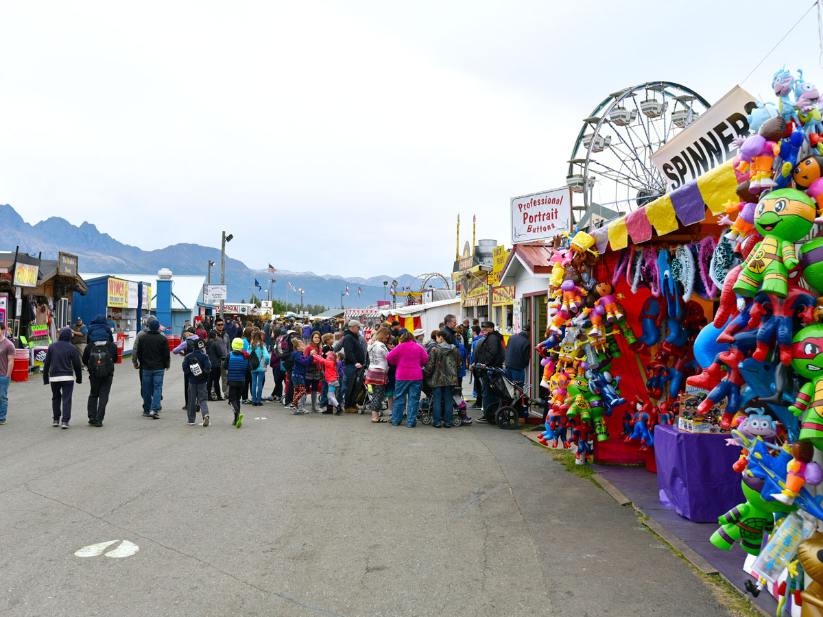 People browsing stalls at the Alaska State Fair