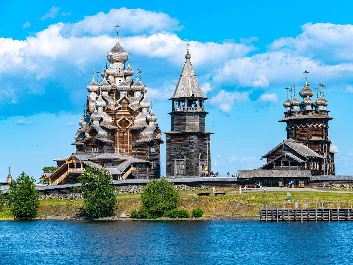 Wooden churches of Russia's Kizhi Pogost, seen from across body of water