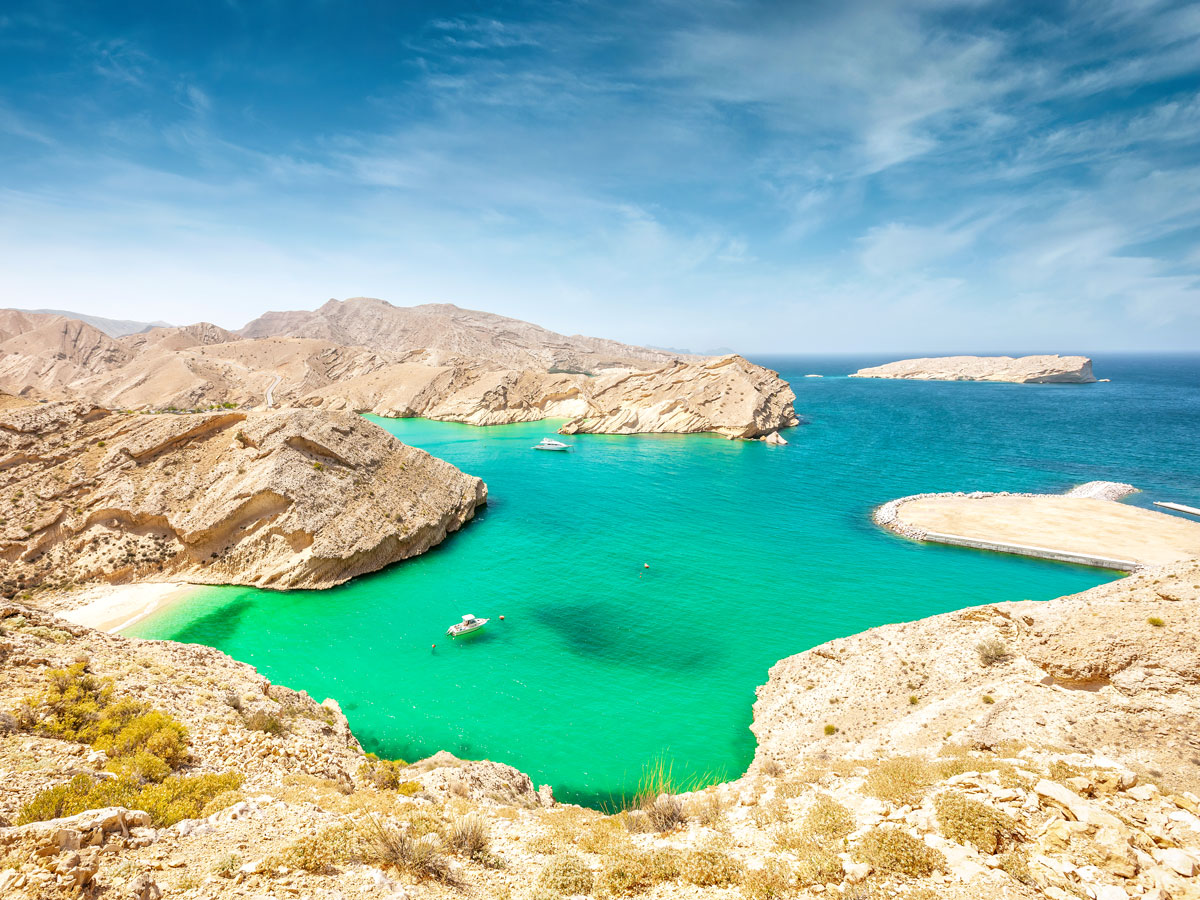 Boat in turquoise waters of the Sargasso Sea, seen from above