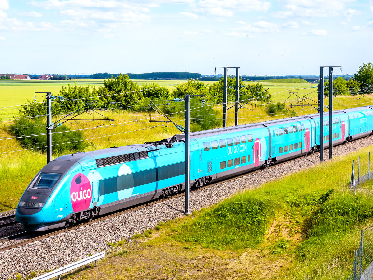 France's Ouigo high-speed train traveling through countryside