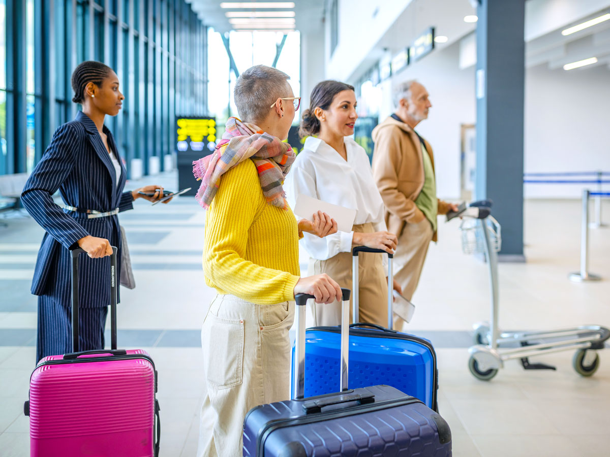 Passengers queuing to board aircraft