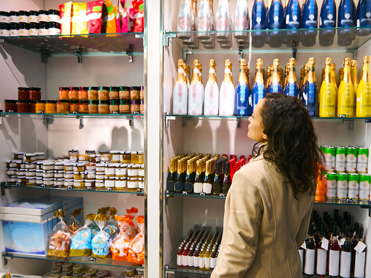 Traveler browsing duty-free goods at airport