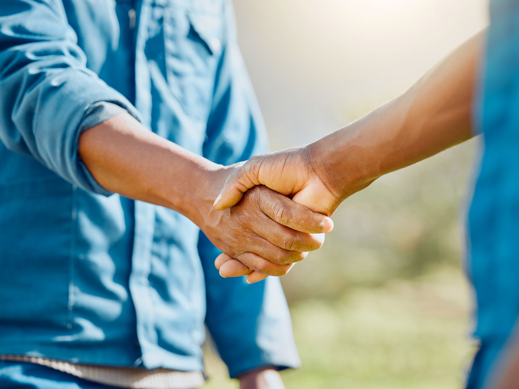 Two people shaking hands