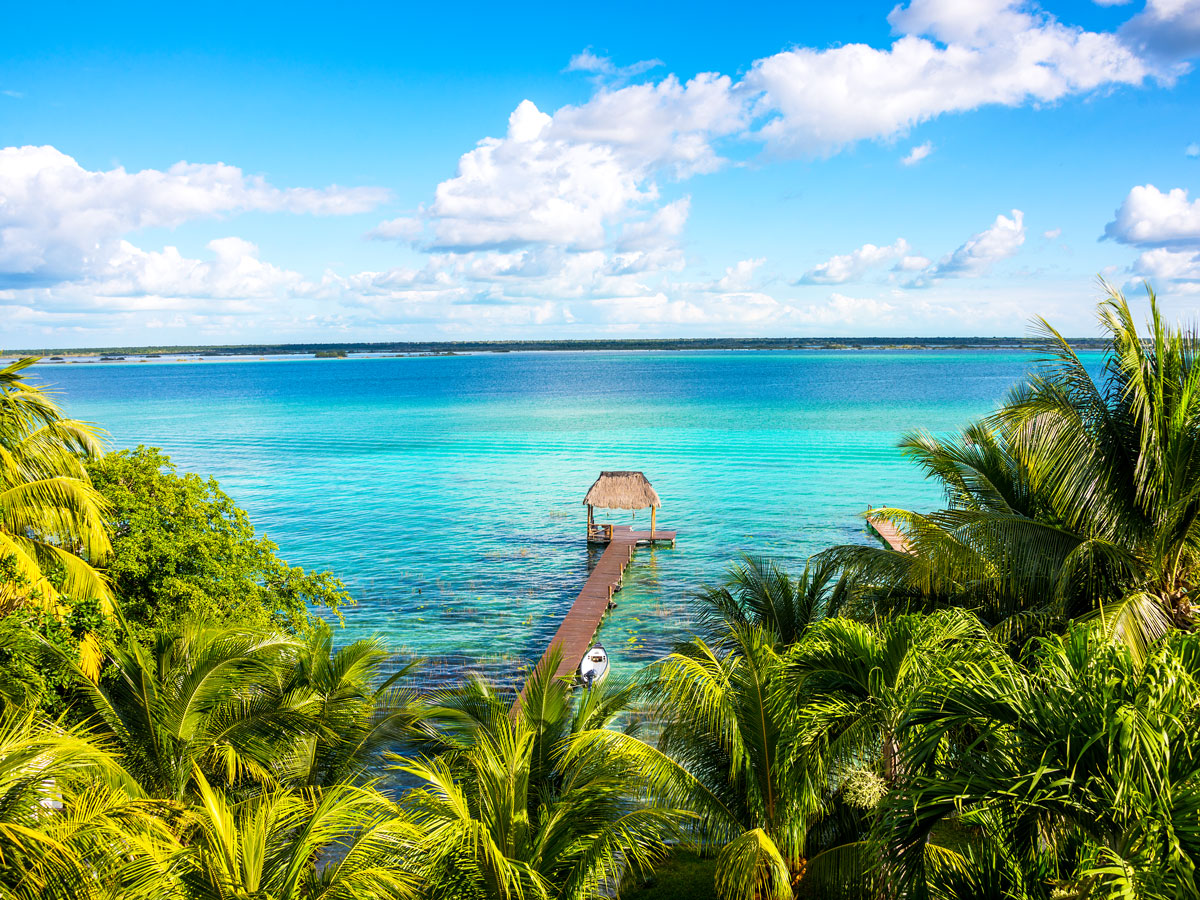 Pier extending out over the turquoise waters of the Caribbean
