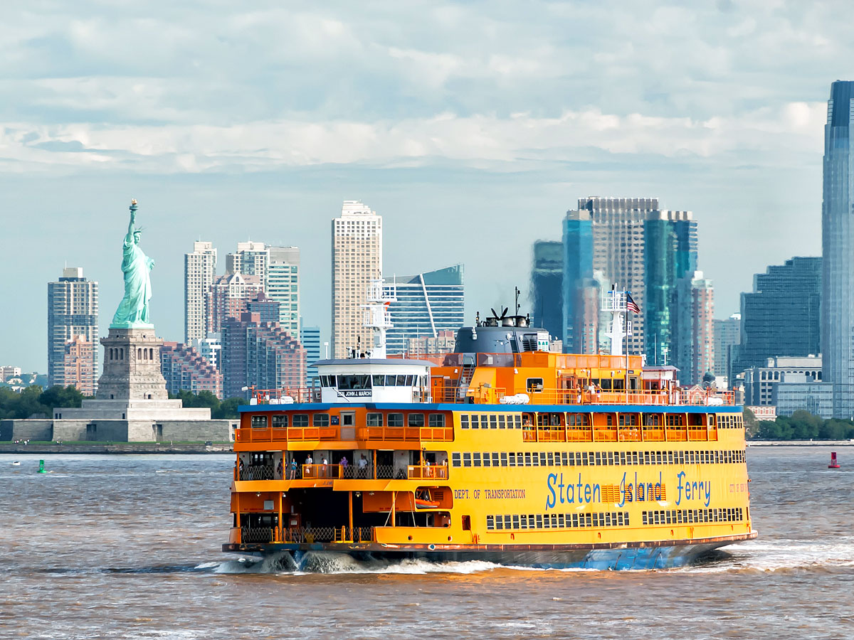 Staten Island Ferry with Statue of Liberty and Manhattan skyline in background