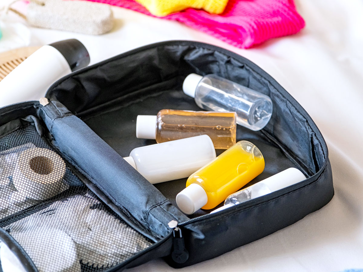 Refillable toiletry bottles in bag