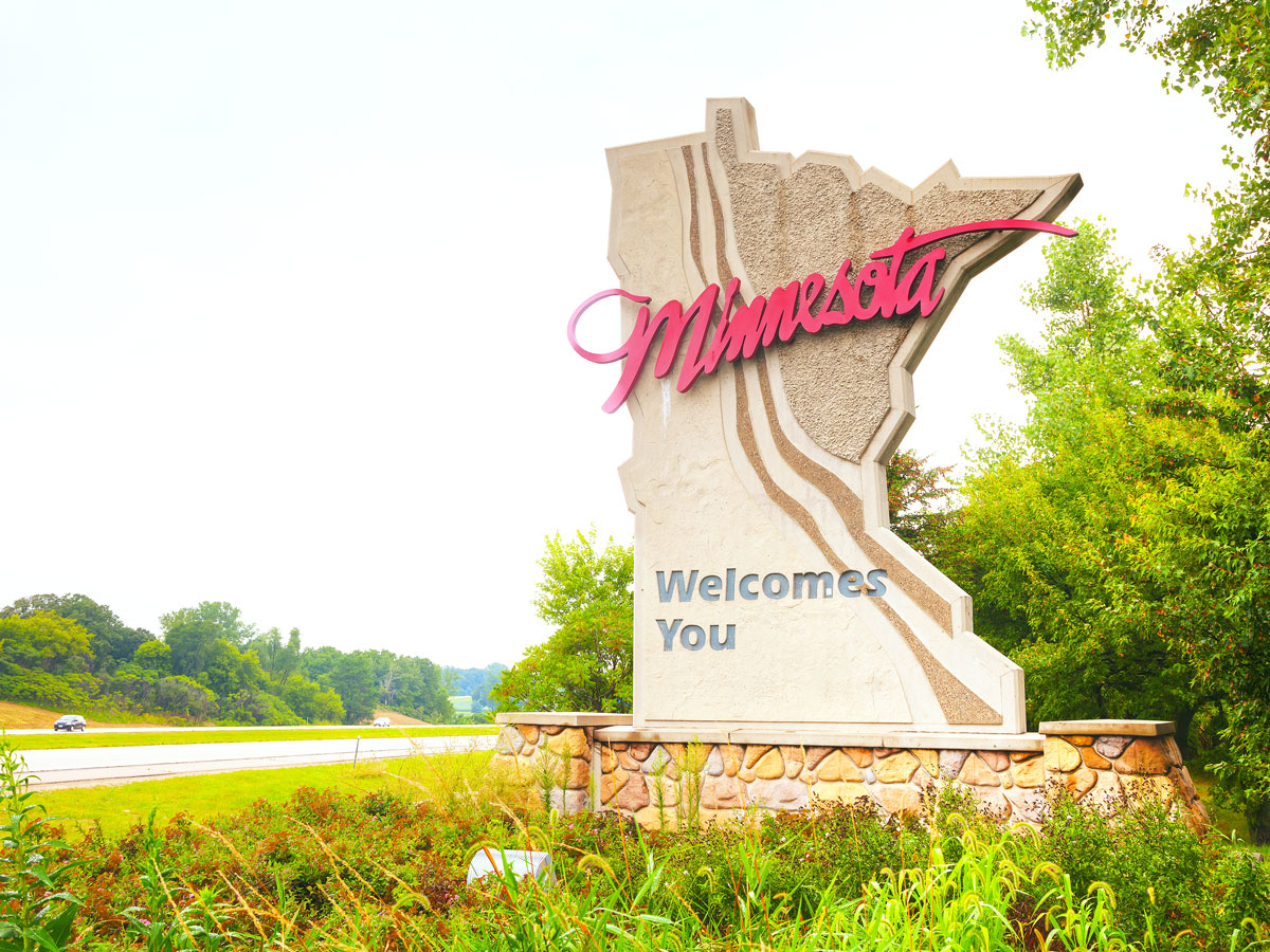 Minnesota welcome sign on side of highway