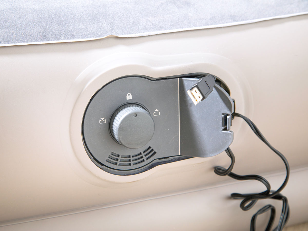 A close-up view of an air mattress pump