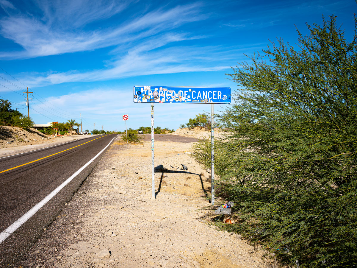 Roadside sign marking the Tropic of Cancer