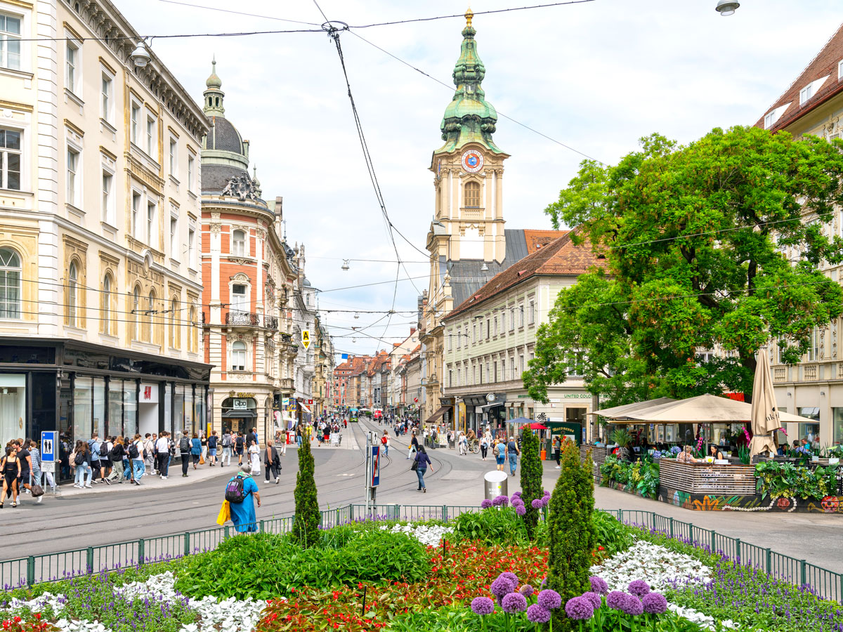 Flowers along busy street in Graz, Austria