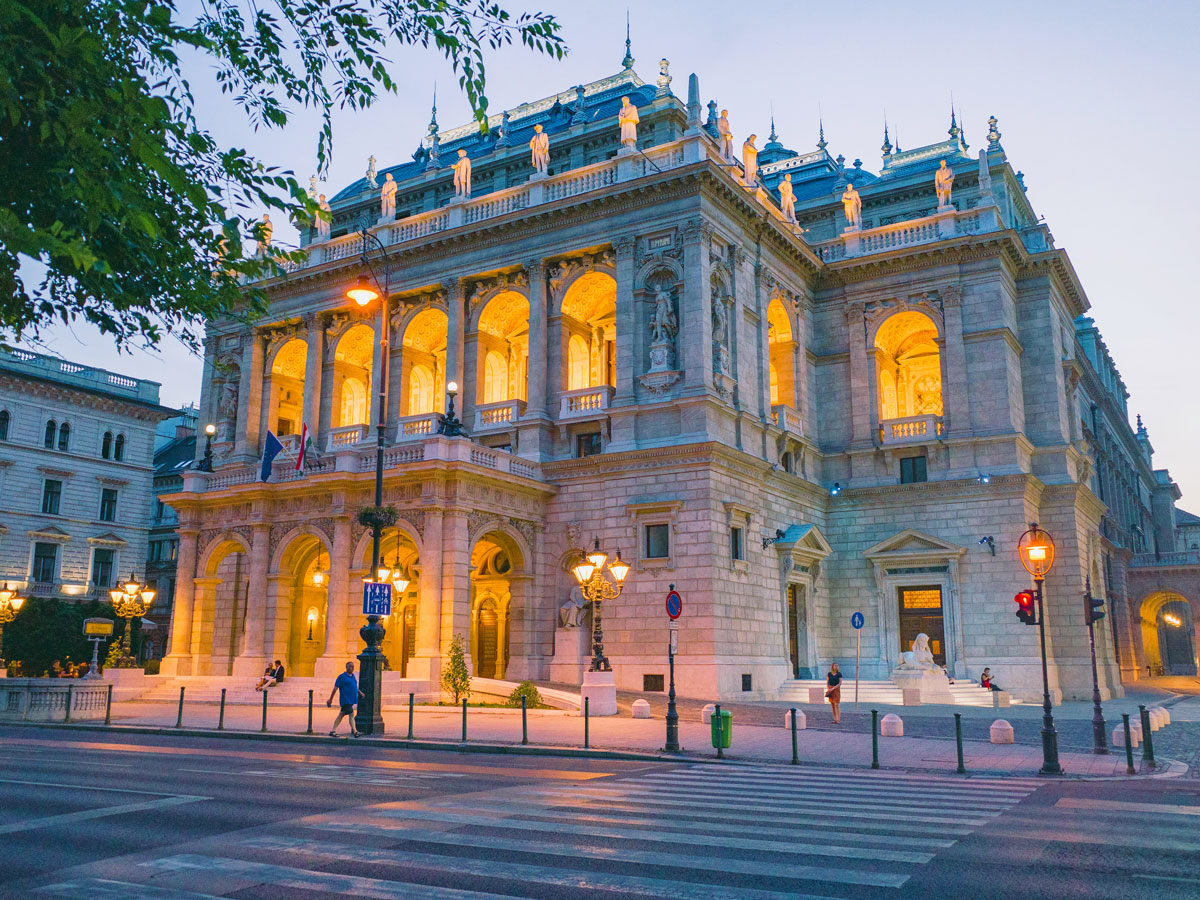 Exterior of the Hungarian State Opera House in Budapest, illuminated at night