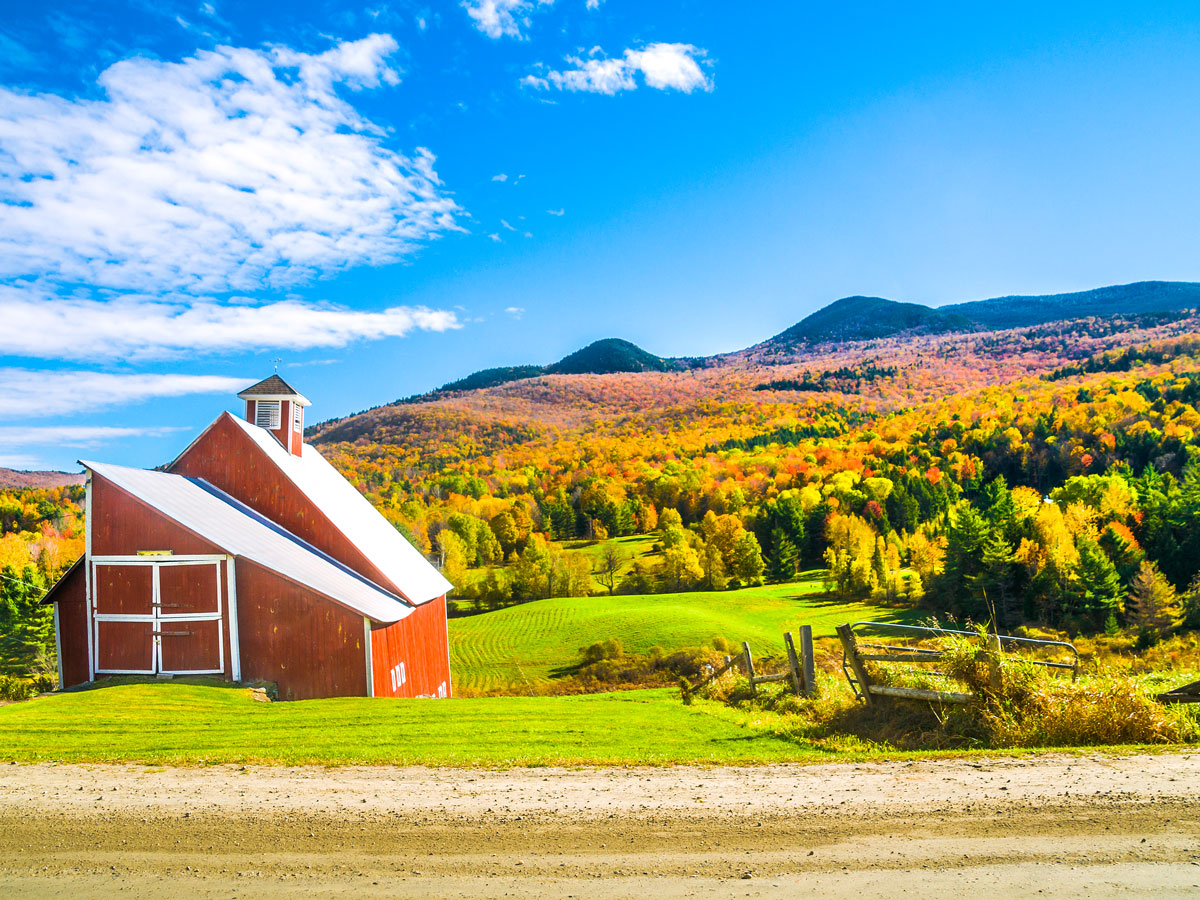 Roadside barn and fall foliage in rural Vermont