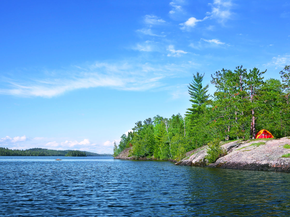 Lake and forested shoreline in Boundary Waters Canoe Area Wilderness in Minnesota