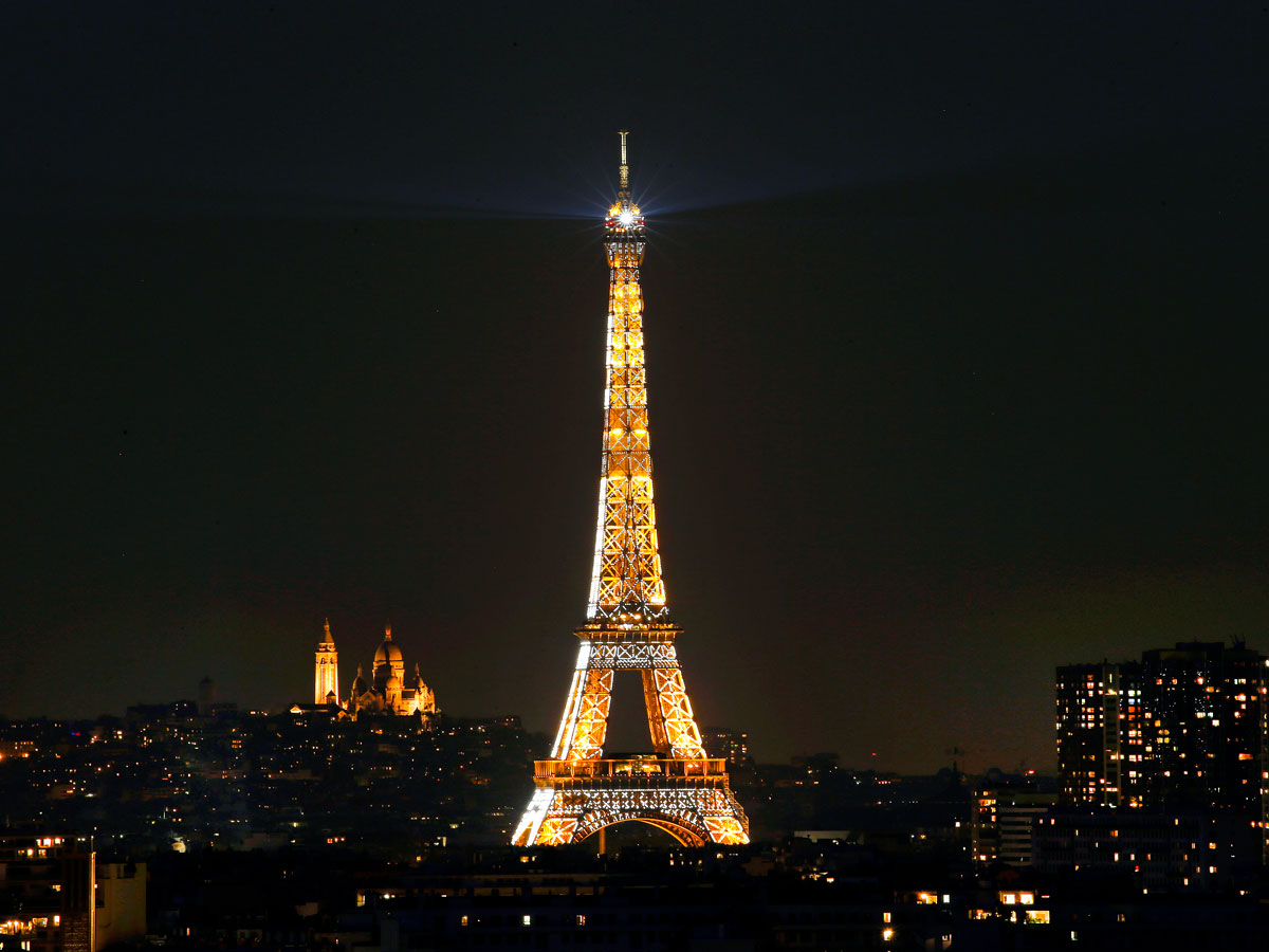 The Eiffel Tower in Paris, France, illuminated at night