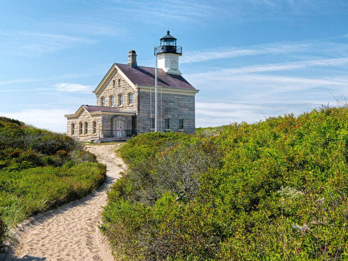 Sandy path leading to lighthouse on Block Island, Rhode Island