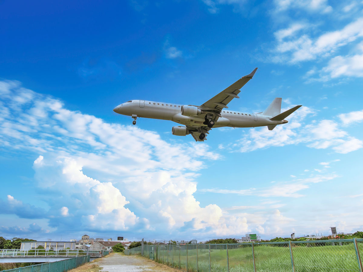 Airplane on final approach to land on runway