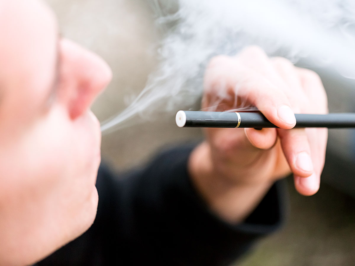 Person using electronic cigarette