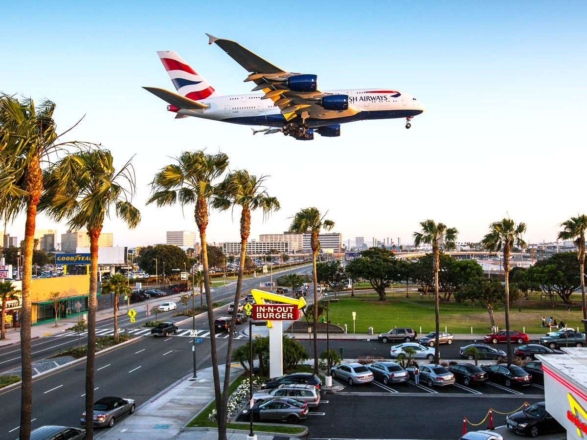 British Airways Airbus A380 landing at Los Angeles International Airport above In-n-Out restaurant