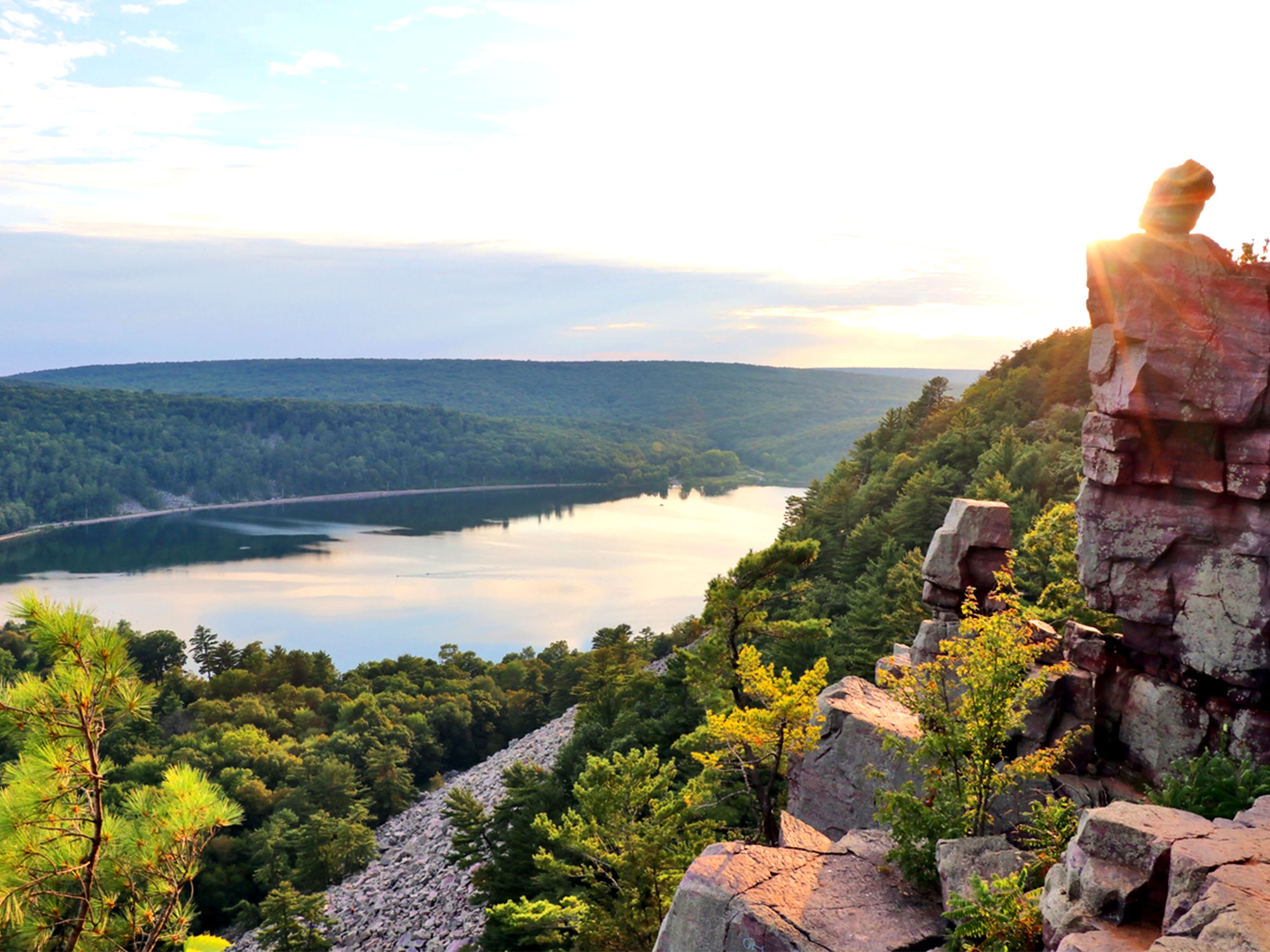 Rocky point overlooking Wisconsin lake at sunset