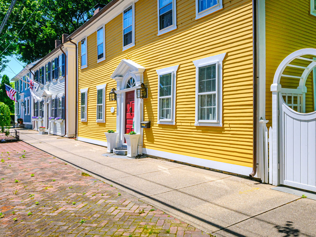 Brightly painted colonial buildings in Wickford, Rhode Island