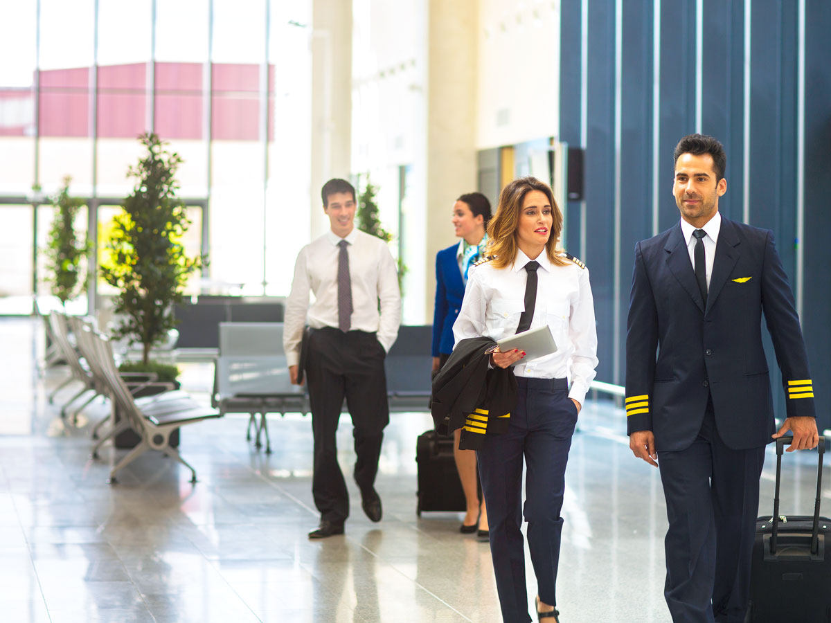 Flight crew walking through airport