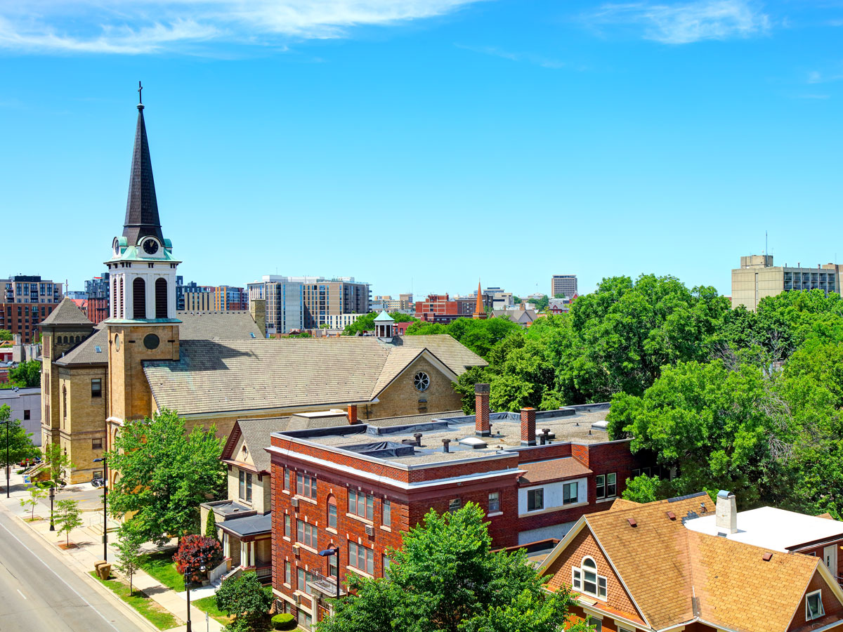 Church tower and homes in Madison, Wisconsin