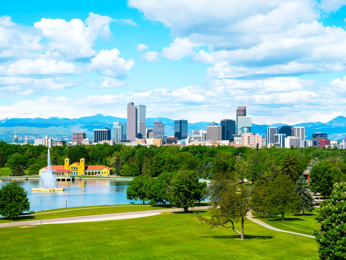 Aerial view of park and Denver skyline