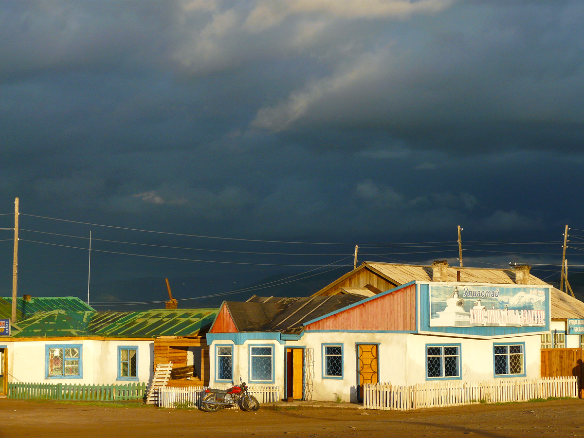 Storm clouds over homes in Tosontsengel, Mongolia