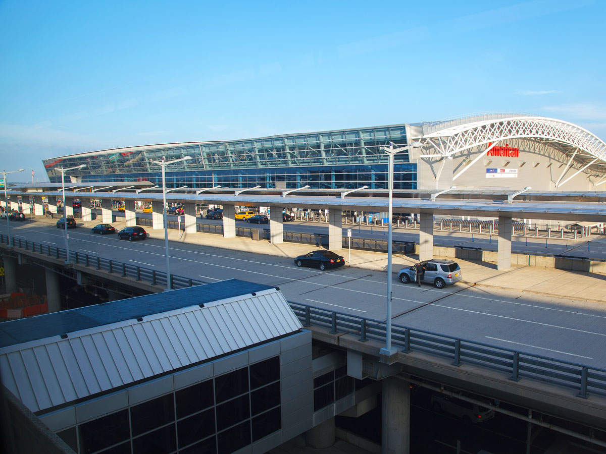 Cars at drop-off area in front of terminal at New York John F. Kennedy International Airport