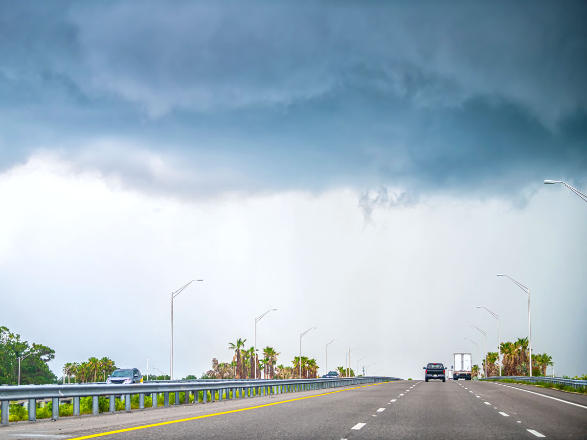 Storm clouds over Orlando highway