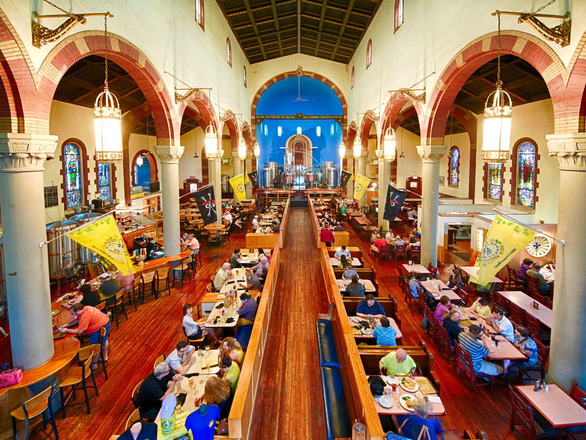 Patrons inside the Church Brew Works in converted church building in Pittsburgh, Pennsylvania