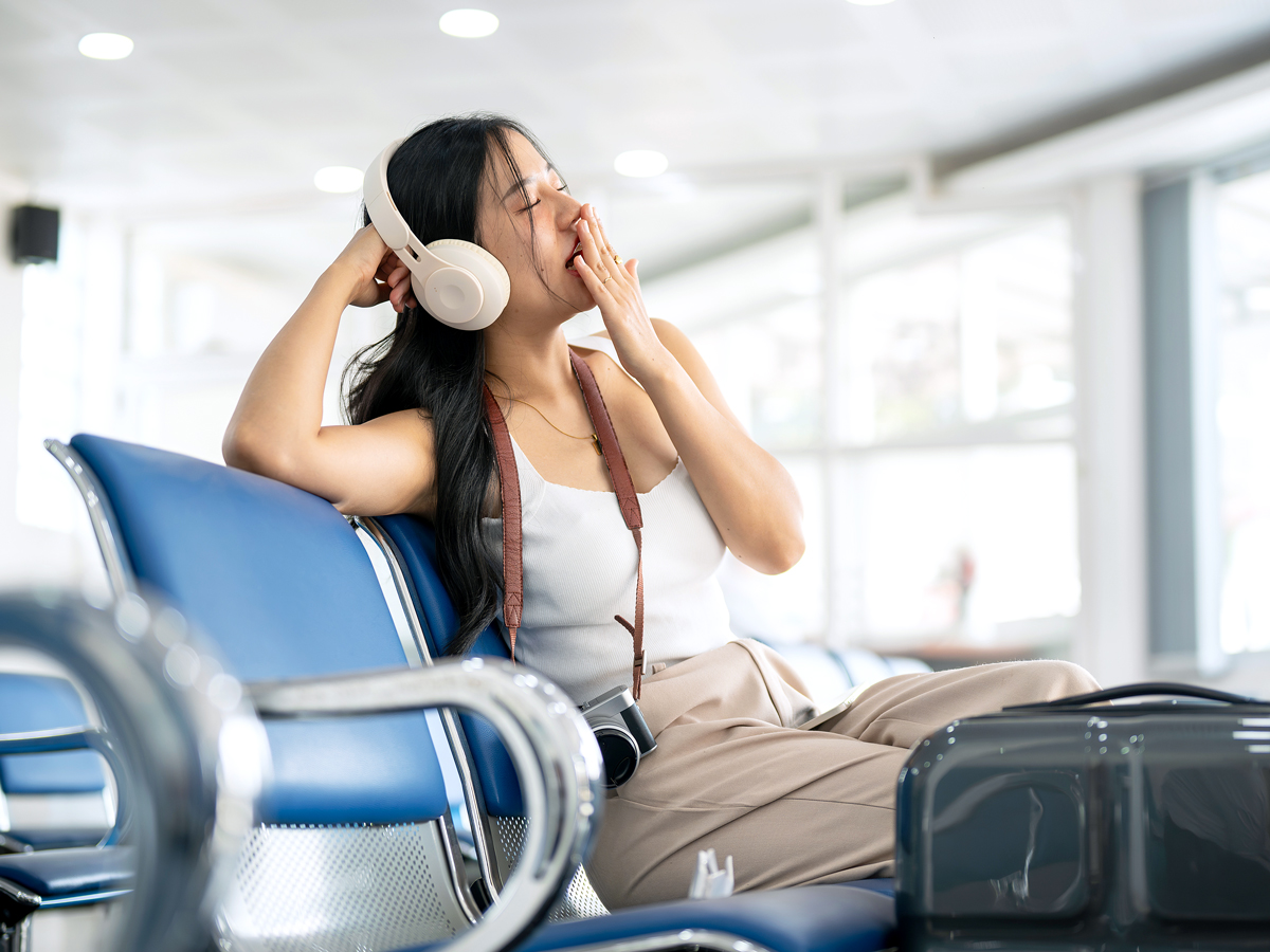 Traveler yawning in terminal
