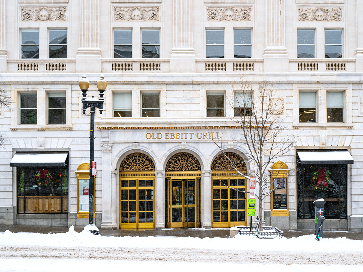 Exterior of the Old Ebbitt Grill on a snowy day
