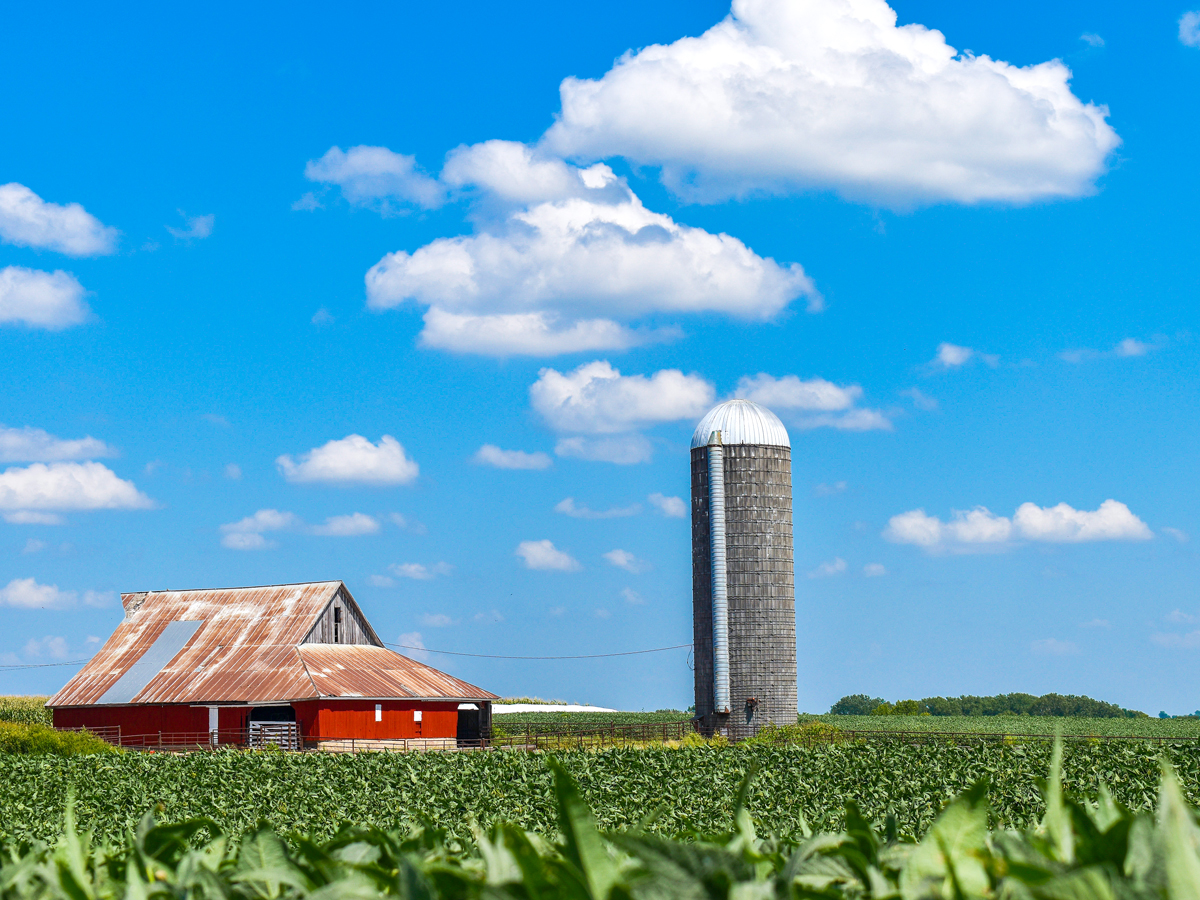 Red barn and grain silo on Kansas farm